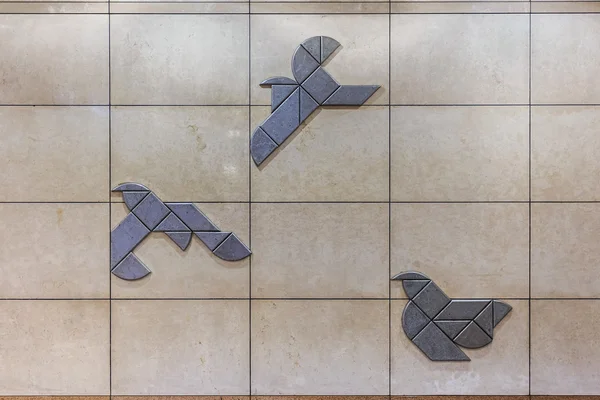 Birds tiles placed on the wall to symbolize peace and freedom — Stock Photo, Image