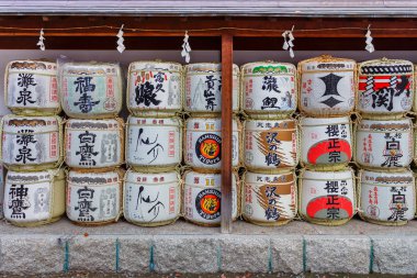 Sake barrels at Ikuta-jinja in Kobe clipart