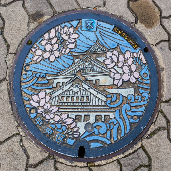 Pokrywa włazu w Osace — Zdjęcie stockowe