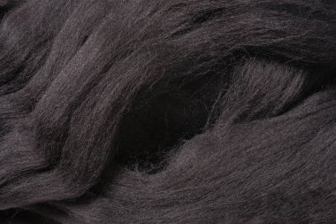 Kesim için doğal siyah yünlü detaylı doku. Yün dokusu yakın çekim