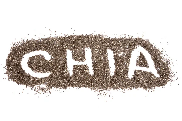 Woord Chia Geschreven Een Verspreide Zaden Achtergrond Een Witte Tafel — Stockfoto