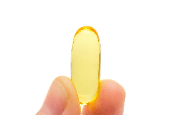 Extreme Close Fish Oil Softgel Capsule Hand Isolated White Background — 图库照片