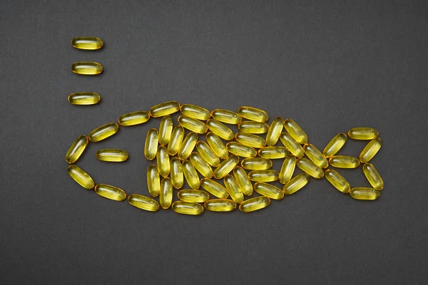 Omega Fish Oil Capsules Arranged Fish Symbol Black Background Fatty — 图库照片