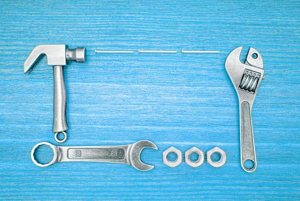 Miniature Copies Hand Tools Fasteners Arranged Blue Background Maintenance Repair — Stock Photo, Image