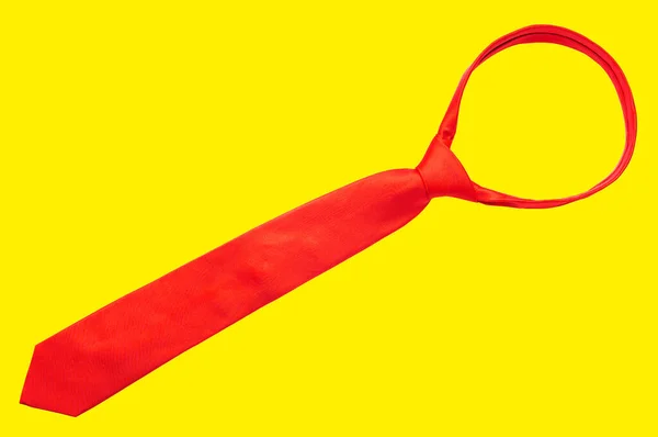 Corbata Roja Atada Aislada Sobre Fondo Amarillo —  Fotos de Stock