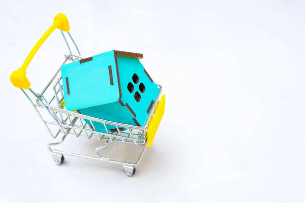 Miniature Wooden House Tiny Shopping Cart Isolated Neutral Background Concept — Fotografia de Stock