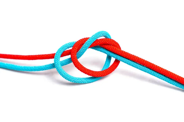 Red Blue Cords Tied Together Isolated Neutral Background Unity Concept — Stock Photo, Image
