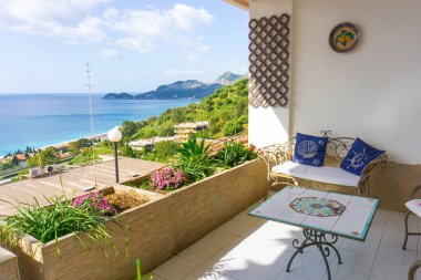 LETOJANNI, ITALY MAY 6, 2019: Gorgeous Ionian Sea view from the mediterranean villa patio