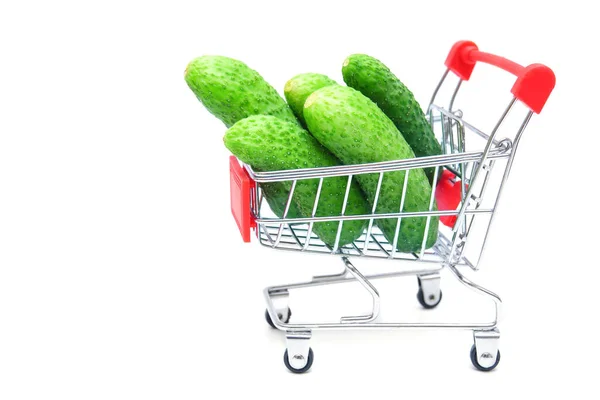 Pile Fresh Cucumbers Miniature Shopping Trolley Isolated White Background Online — Fotografia de Stock