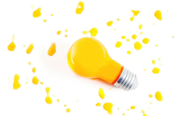 Incandescent Light Bulb Filled Orange Juice White Background Creative Energy — Stockfoto