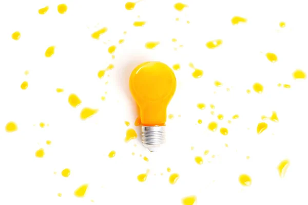 Incandescent Light Bulb Filled Orange Juice White Background Covered Liquid — Stockfoto