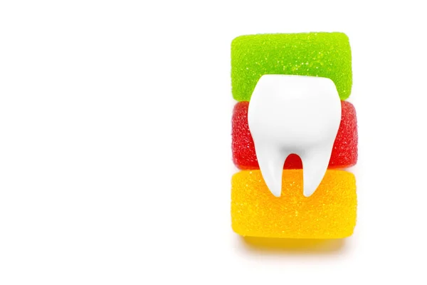 Large White Tooth Model Placed Top Colorful Jelly Candies Isolated — Stock Photo, Image