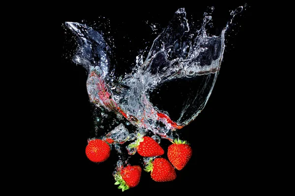 Fresh Ripe Strawberries Splashing Underwater Black — Foto Stock
