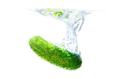 Fresh cucumber falling underwater with splashes isolated on white background.