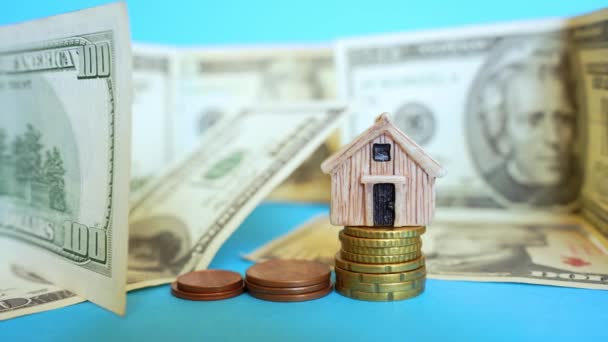 Wooden House Model Placed Top Coins Stack Paper Currency Background — Wideo stockowe