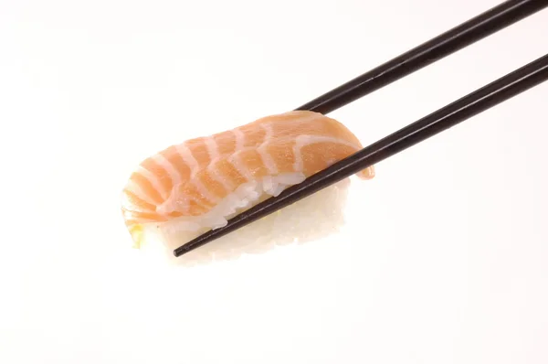 Sushi mit Stäbchen — Stockfoto