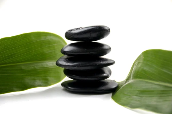 Stacked in perfect balance with leaf — Stock Photo, Image