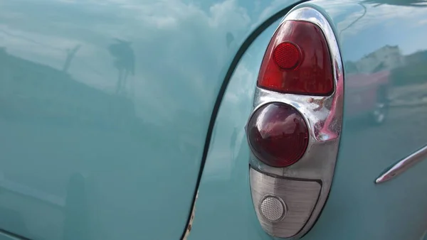 Tail light of a green retro car close-up, Cuba, Havana