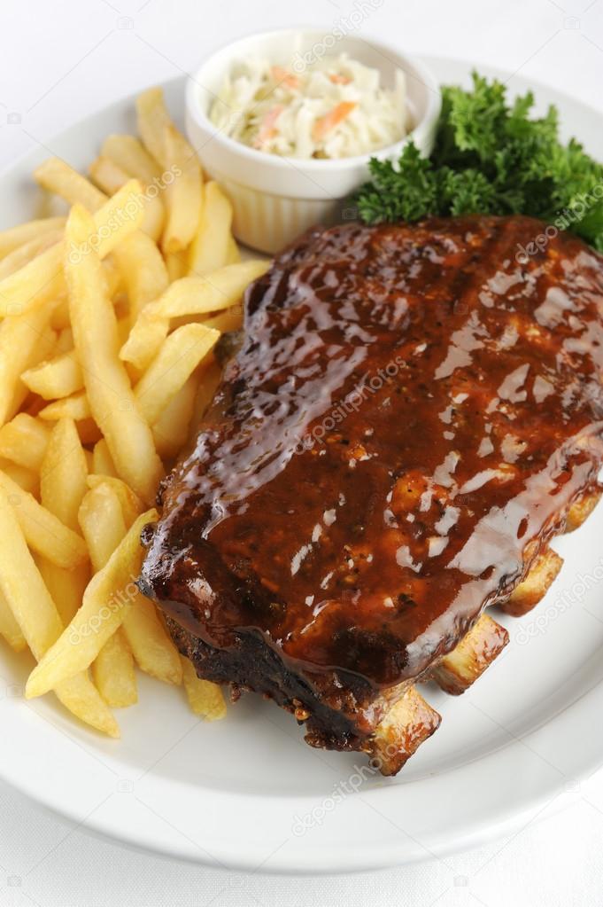 Grilled barbecue ribs and fries Stock Photo by ©fotocat10 20667401
