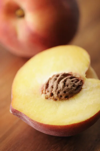 Peach cut in half