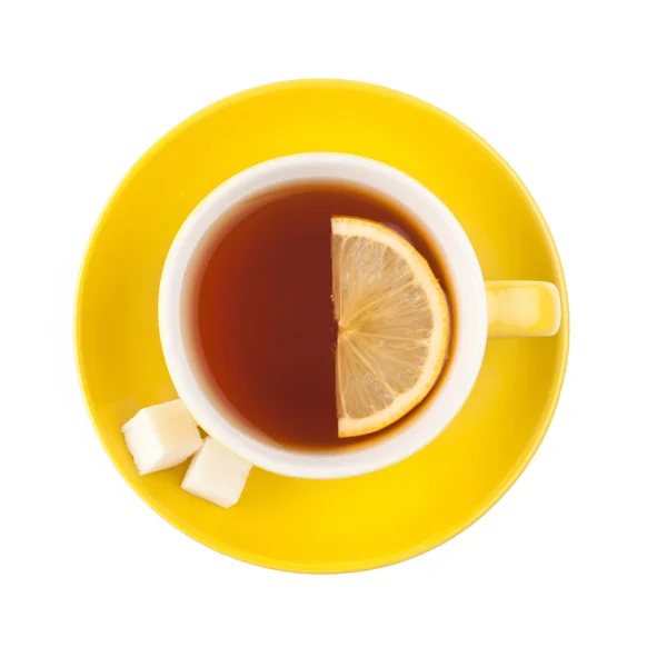 Yellow teacup with sugar and lemon — Stock Photo, Image