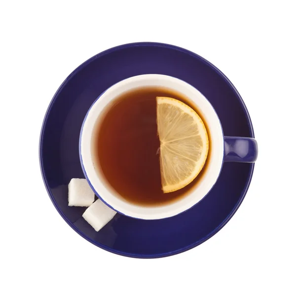 Dark blue teacup with sugar and lemon. — Stok fotoğraf