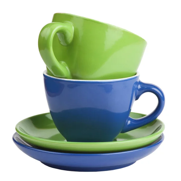 Multicolored teacups and saucers — Stock Photo, Image