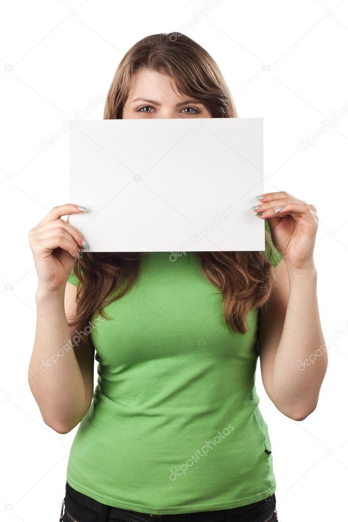 Young woman closing a half of her face with white sign