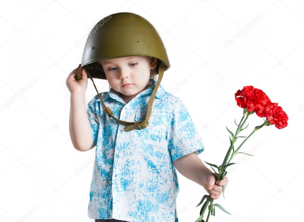 Boy with helmet and carnations
