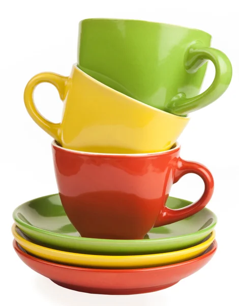 Pile de tasses à thé multicolores et soucoupes — Photo