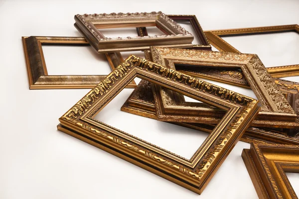 Stapel van vintage frame op witte achtergrond — Stockfoto