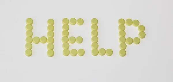 Palabra "Ayuda" hecha por pastillas —  Fotos de Stock