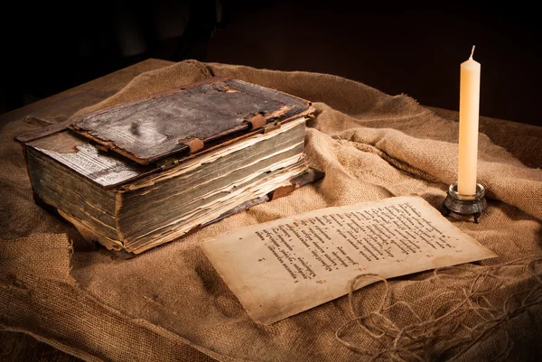 Antique book, paper and candle — Stock Photo, Image