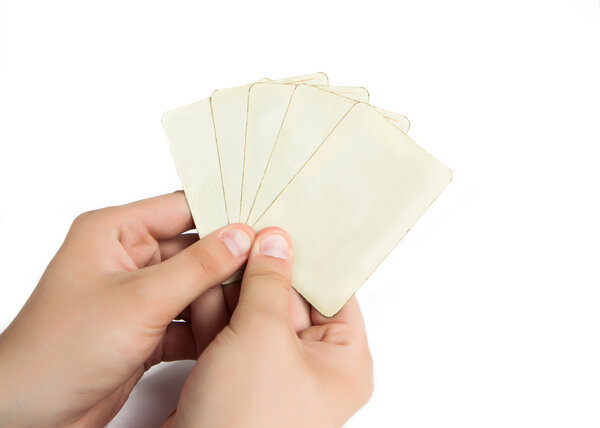 Hand with five empty playing cards