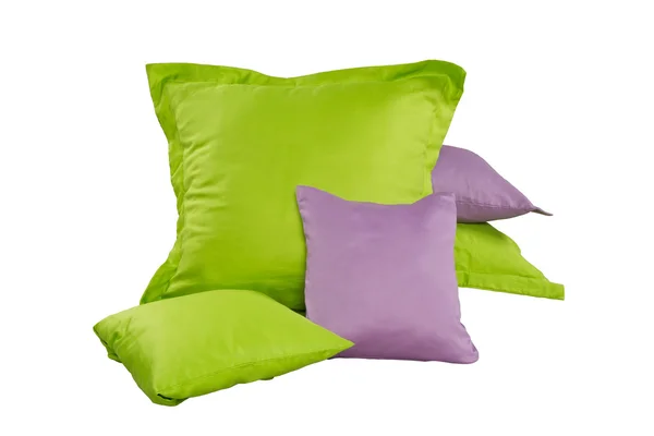 Куча зеленых и фиолетовых подушек — стоковое фото
