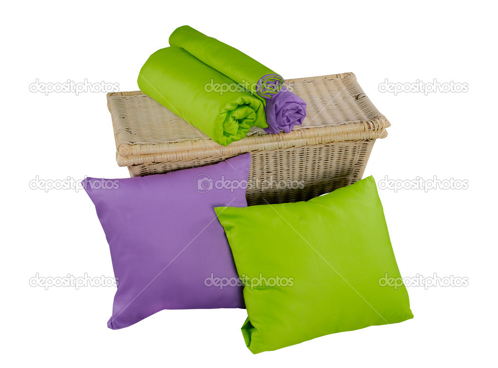 Colorful pillows and twisted blankets