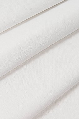 Katlanmış pamuk beyazı çarşaf. Makro. ekleme örneği