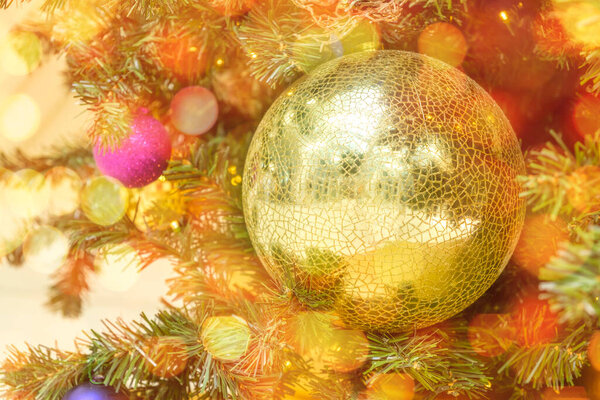 Christmas balls decorate Christmas tree with balls and garland lights with copy space. Preparation to the New Year. 