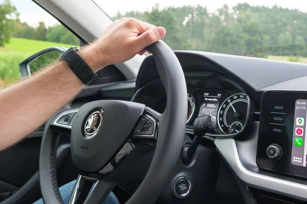 Close up man hand on the wheel of Skoda car while driving, September 2021, Poprad, Slovakia — стокове фото