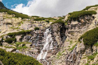Amazing view of the waterfall in Tatra mountains in Slovakia