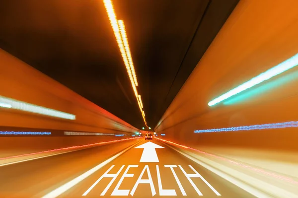 Texto de saúde na estrada do túnel — Fotografia de Stock