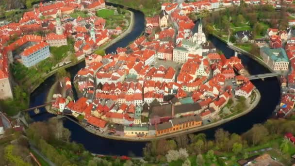 Fly over old town of Cesky Krumlov and river Vltava in the South Bohemian Region, Czech Republic