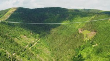 Aerial view of suspension Sky Bridge 721 in mountains, Dolni Morava, Czech Republic