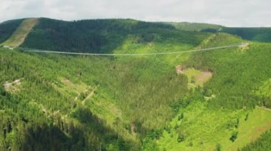 Aerial view of suspension Sky Bridge 721 in mountains, Dolni Morava, Czech Republic