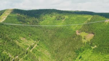 Aerial view of suspension Sky Bridge 721 in mountains, Dolni Morava, Czech Republic