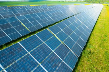 Solar panels in the green field for generation of green energy safety for environmental 