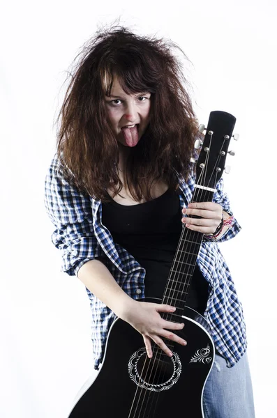 Teenage girl with a guitar — Stock Photo, Image