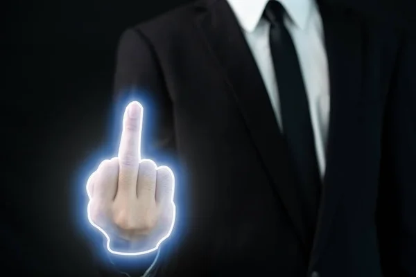 Unrecognizable businessman in smart casual showing a middle finger, the middle finger with the illuminated neon effect close up. Impolite man showing a middle finger.