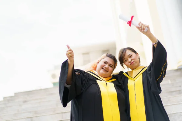 Happy Asian Young Women Master Degree Gown Showing Diploma Hand — Foto Stock