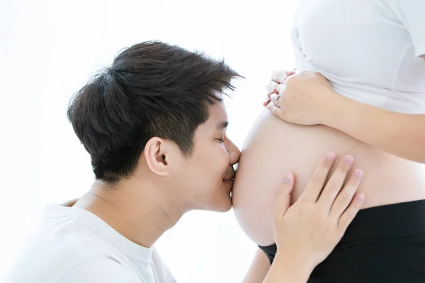 Happy Asian Family Cheerful Husband Tenderly Kissing His Wife Stomach — Fotografia de Stock